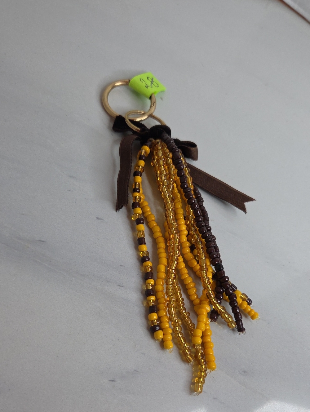 28 - Beaded Tassel Brown And Yellow Bag Charm
